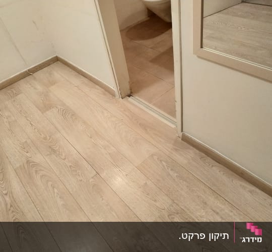 התקנת פרקט למינציה בגוון אלון בהיר כולל פנלים תואמים